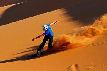 Sandboarding in Merzouga Dunes